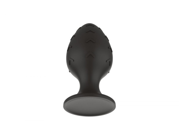 Черная средняя силиконовая анальная пробка с рельефом в виде галочек Черная средняя силиконовая анальная пробка с рельефом в виде галочек