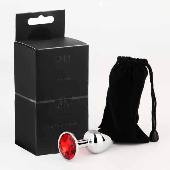 Серебристая анальная втулочка с красным кристаллом - 7 см. Серебристая анальная втулочка с красным кристаллом - 7 см.