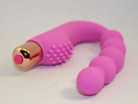 Розовый силиконовый вибромассажер в форме подковы Розовый силиконовый вибромассажер в форме подковы