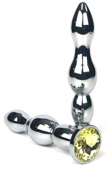 Серебристая металлическая анальная пробка-ёлочка с желтым кристаллом - 12 см. Серебристая металлическая анальная пробка-ёлочка с желтым кристаллом - 12 см.
