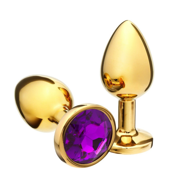Золотистая анальная пробка с фиолетовым кристаллом - 8,5 см. Золотистая анальная пробка с фиолетовым кристаллом - 8,5 см.
