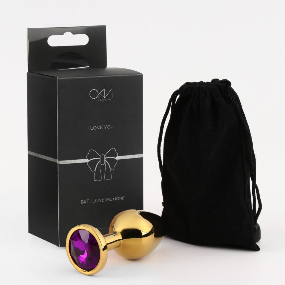 Золотистая анальная пробка с фиолетовым кристаллом - 8,5 см. Золотистая анальная пробка с фиолетовым кристаллом - 8,5 см.