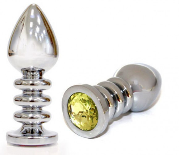 Большая серебристая анальная пробка с жёлтым кристаллом - 10 см. Большая серебристая анальная пробка с жёлтым кристаллом - 10 см.